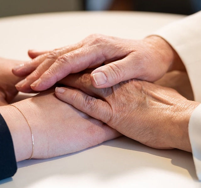 two people holding hands