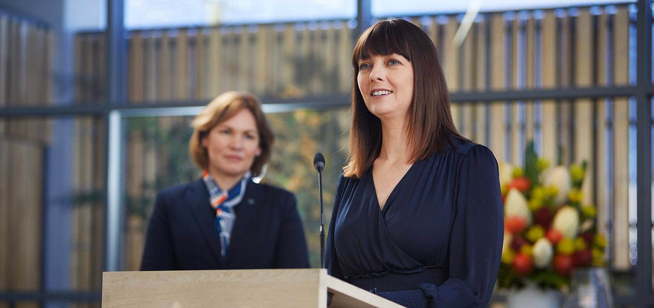 women conducting a eulogy