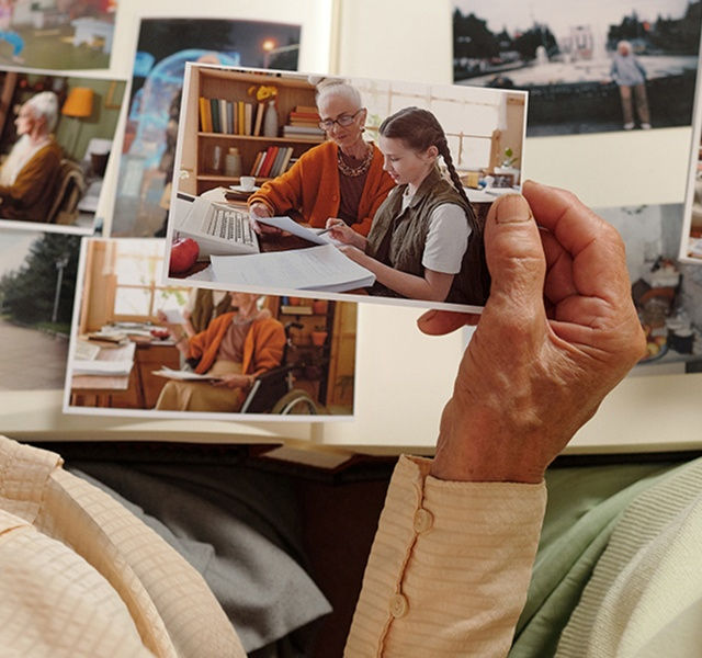 a person holding a photo