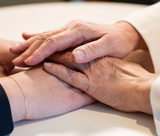 two people holding hands