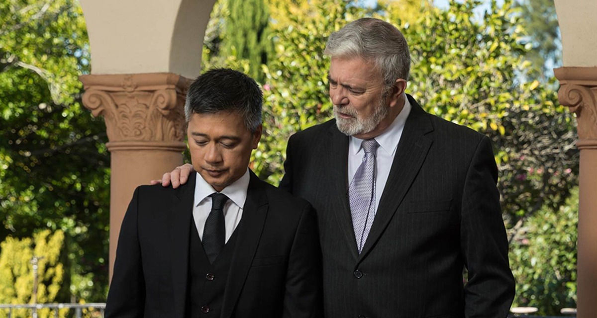funeral director with a man