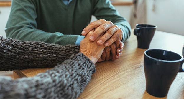 two people holding hands